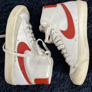 Nike White High-Top Sneakers with Red Swoosh